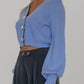 Cardigan crop con bottoni gioiello azzurro