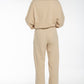 Pantalone jogger beige con fondo ampio