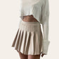 Minigonna stile collegiale beige con balze