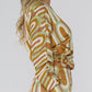 Cardigan con fantasia geometrica camel e verde menta