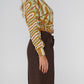 Cardigan con fantasia geometrica camel e verde menta
