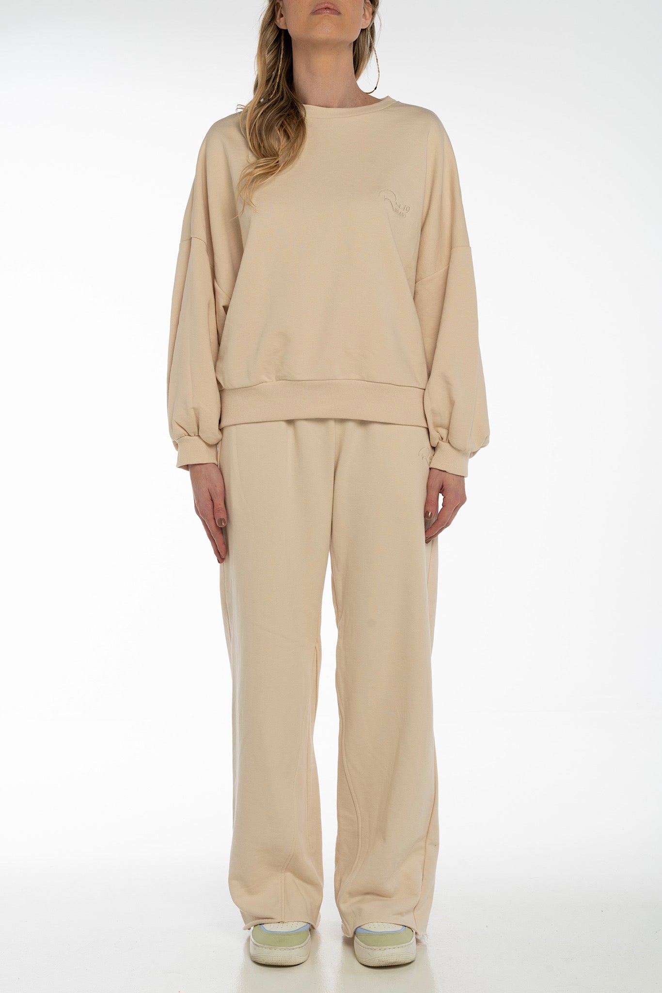 Pantalone jogger beige con fondo ampio