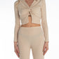 Maglia a maniche lunghe color crema a costine