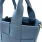 Borsa in vera pelle a secchiello con intreccio